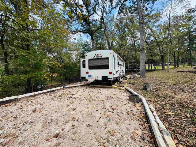 a pathway of a house with a yard