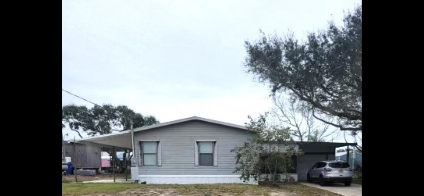 a view of a house with a patio