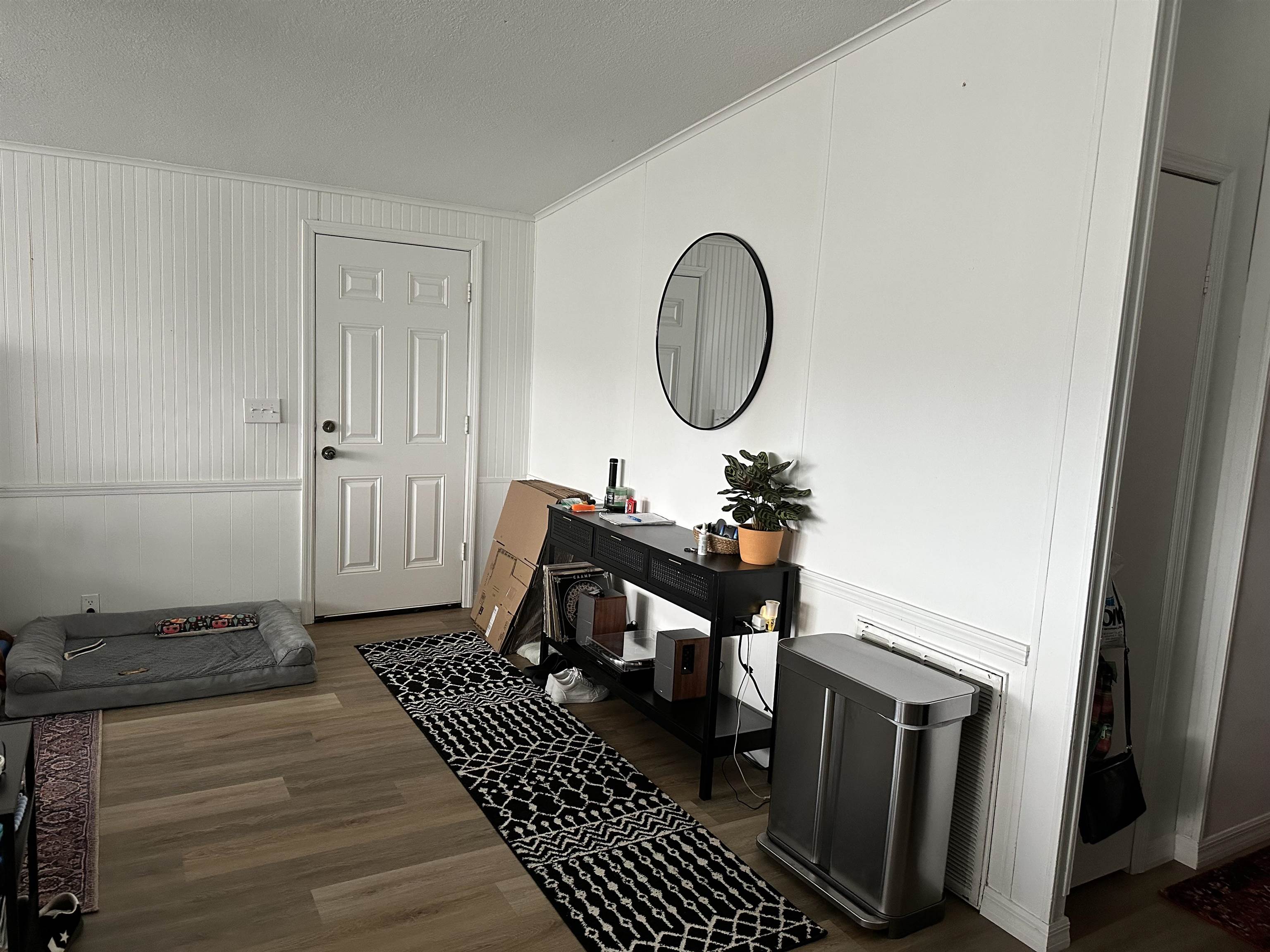 272 Pizarro Road St. Augustine, FL 32080 - Photo 17 of 23 a living room with furniture and a mirror