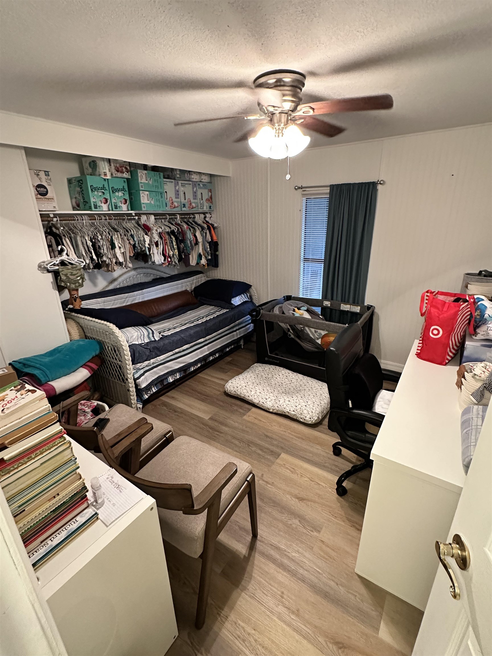 272 Pizarro Road St. Augustine, FL 32080 - Photo 19 of 23 a bedroom with a bed and wooden floor