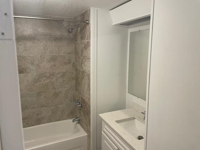 272 Pizarro Road St. Augustine, FL 32080 - Photo 8 of 23 a bathroom with a tub shower sink vanity and a sink