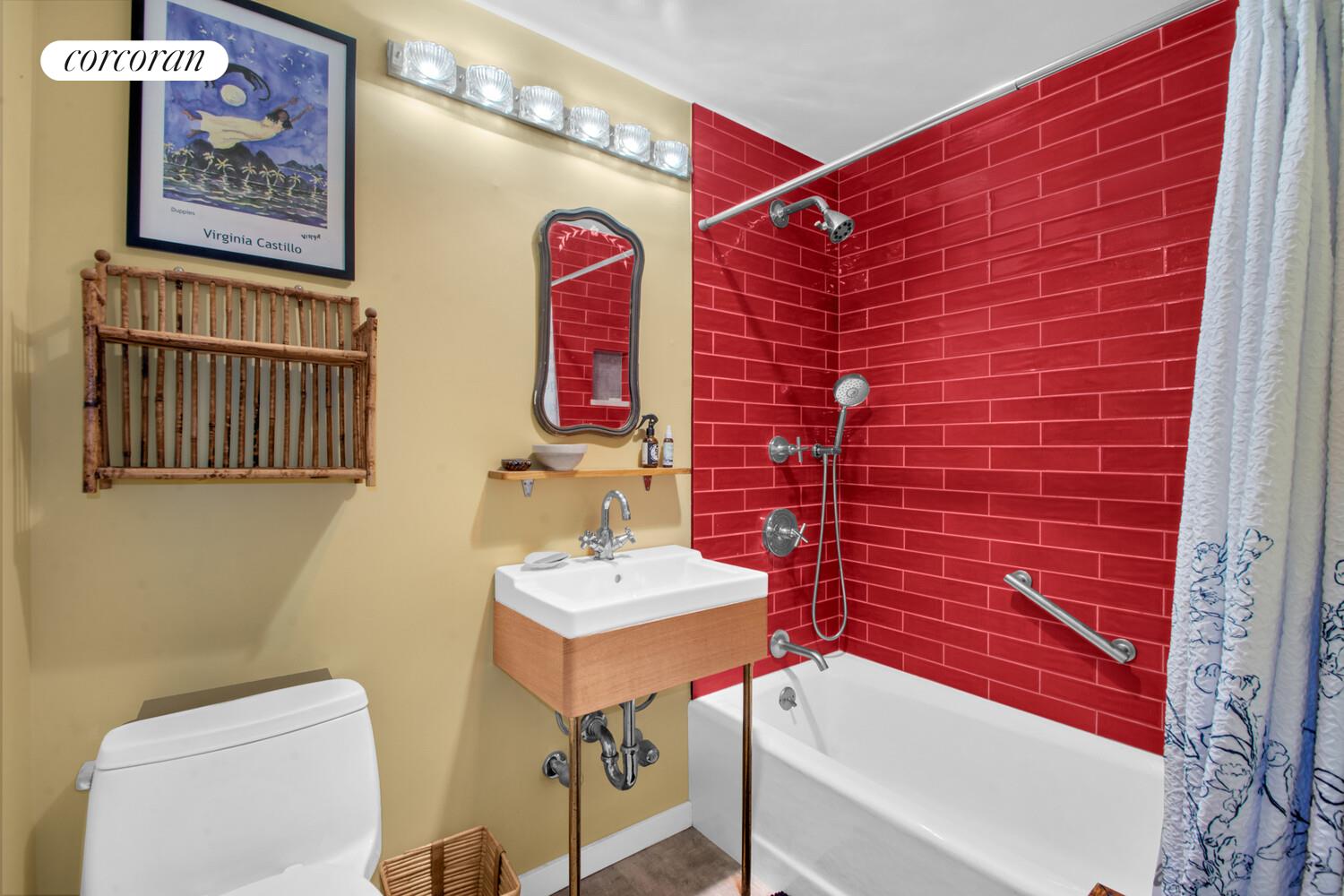 23 Waverly Place, Unit 4W Manhattan, NY 10003 - Photo 6 of 7 a bathroom with a toilet and a sink