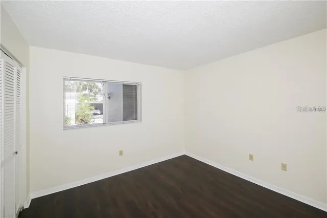 a bathroom with a toilet and a bathtub