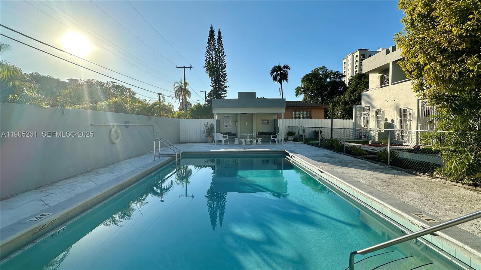 a view of a house with swimming pool