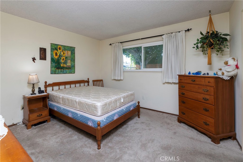 1085 Tamarack Avenue Brea, CA 92821 - Photo 14 of 28 a bedroom with a bed and a window
