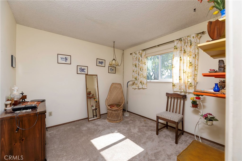 1085 Tamarack Avenue Brea, CA 92821 - Photo 16 of 28 a living room with furniture and a window