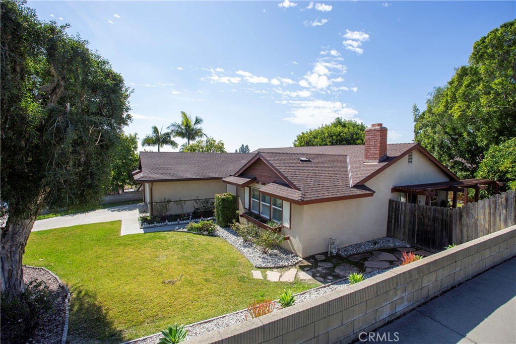 1085 Tamarack Avenue Brea, CA 92821 - Photo 5 of 28 a view of a house with pool and chairs