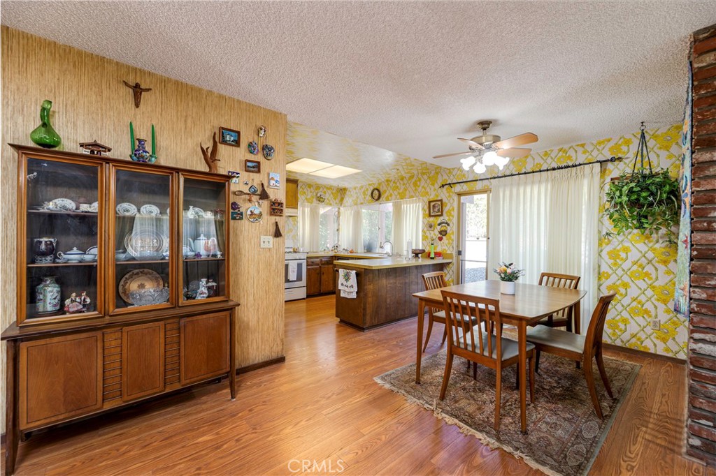 1085 Tamarack Avenue Brea, CA 92821 - Photo 9 of 28 a view of a dining room with furniture and chandelier