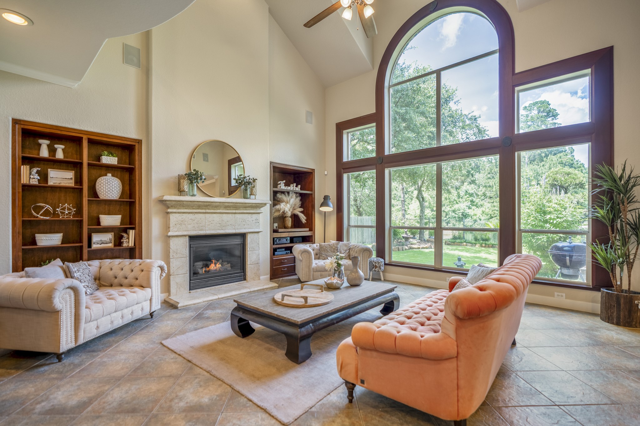 67 North Pentenwell Circle Spring, TX 77382 - Photo 9 of 50 a living room with furniture and a fireplace