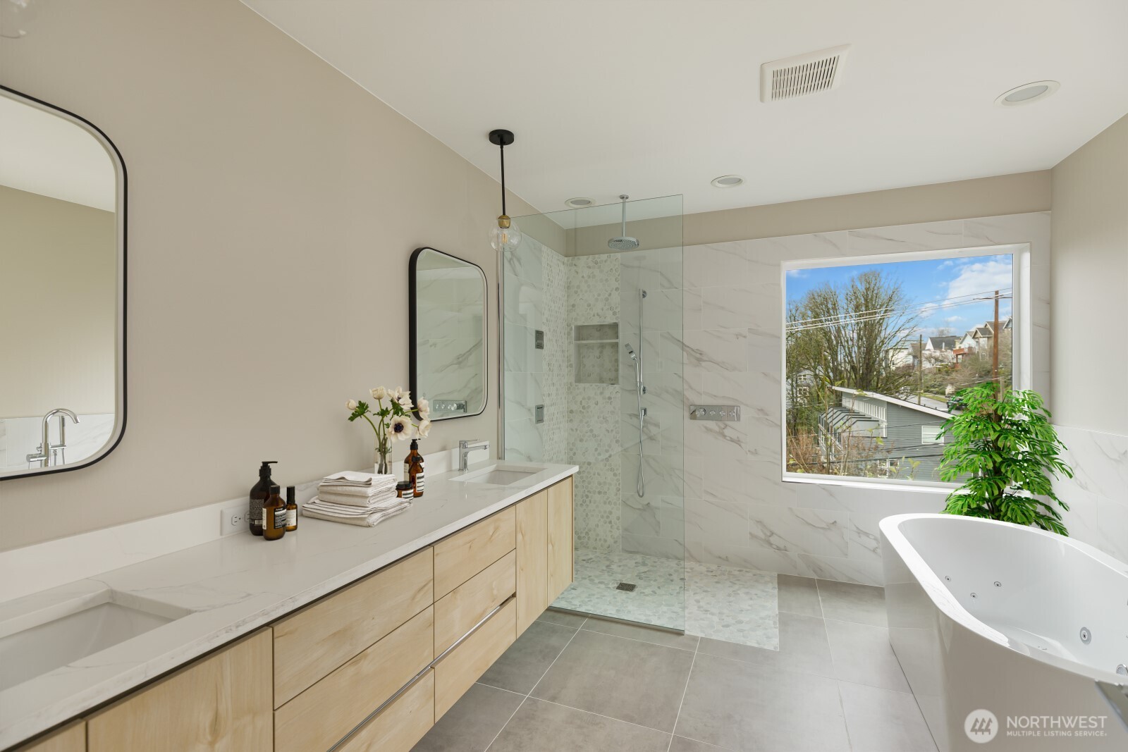 4009 21st Avenue Southwest Seattle, WA 98106 - Photo 2 of 36 a bathroom with a double vanity sink mirror and bathtub