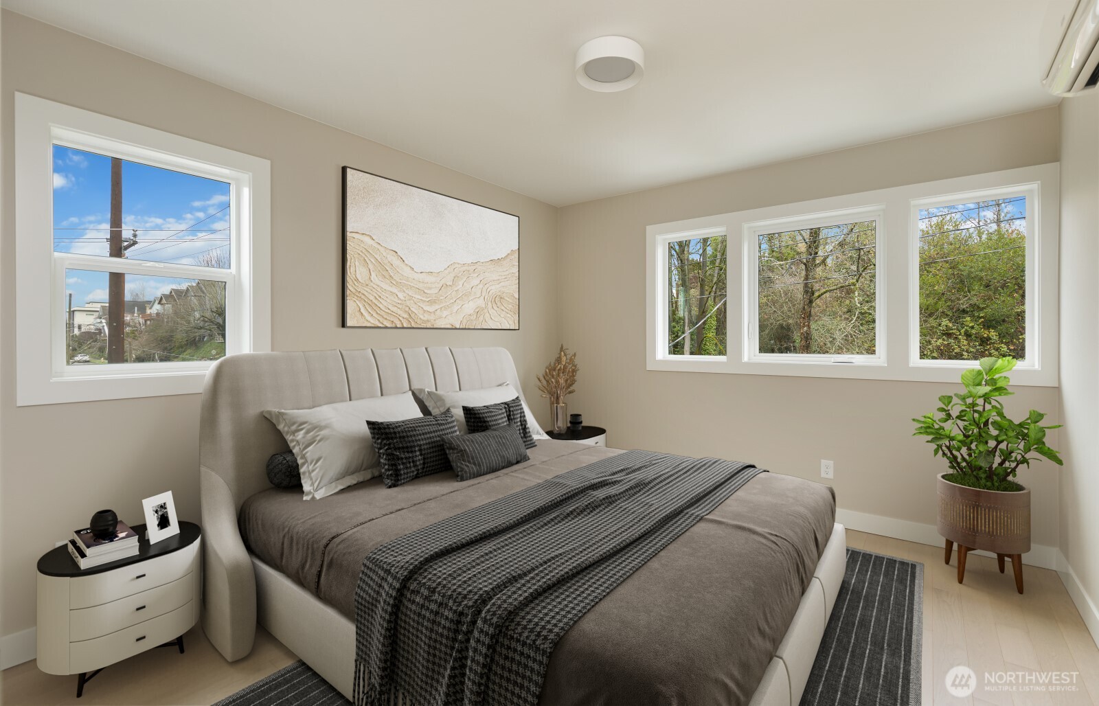 4009 21st Avenue Southwest Seattle, WA 98106 - Photo 24 of 36 a bedroom with a bed and a large window
