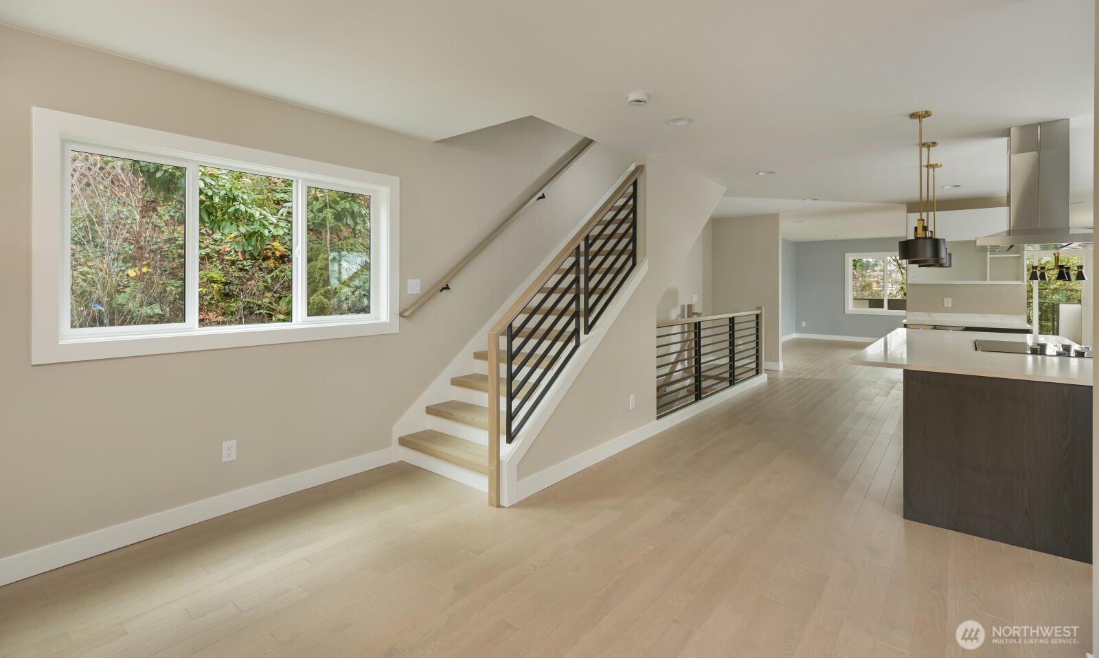4009 21st Avenue Southwest Seattle, WA 98106 - Photo 31 of 36 a view of a kitchen with furniture and windows