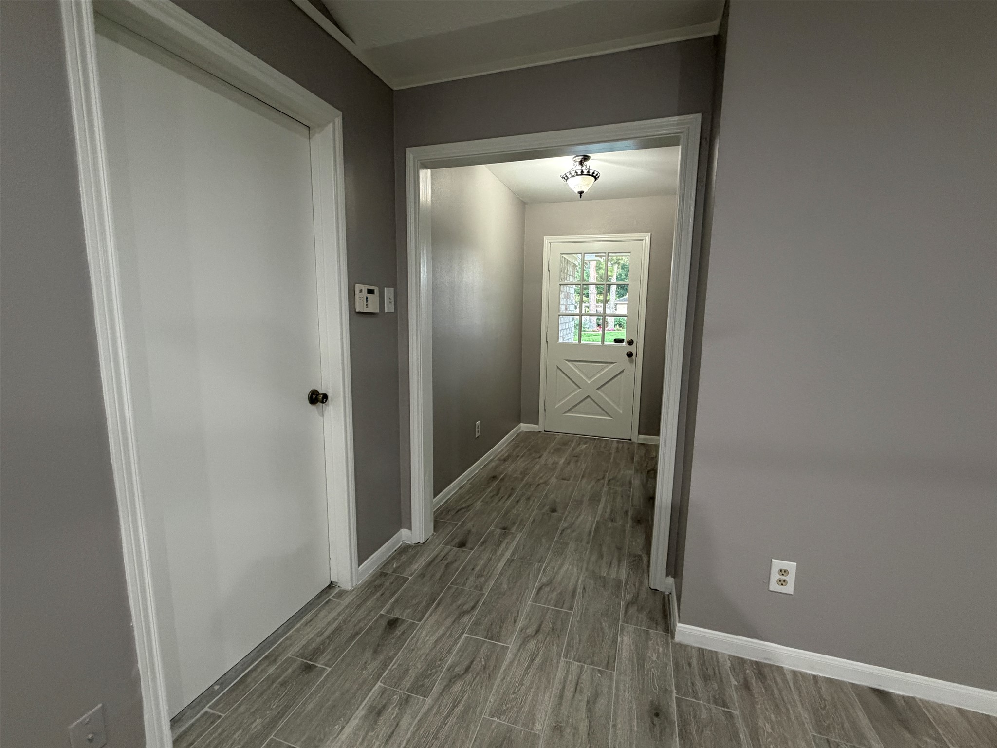 3815 Avenue R Rosenberg, TX 77471 - Photo 12 of 14 a view of a hallway with wooden floor