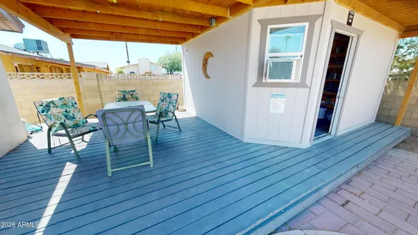 a house view with a backyard space