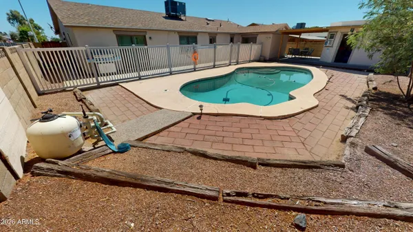 a swimming pool with a yard