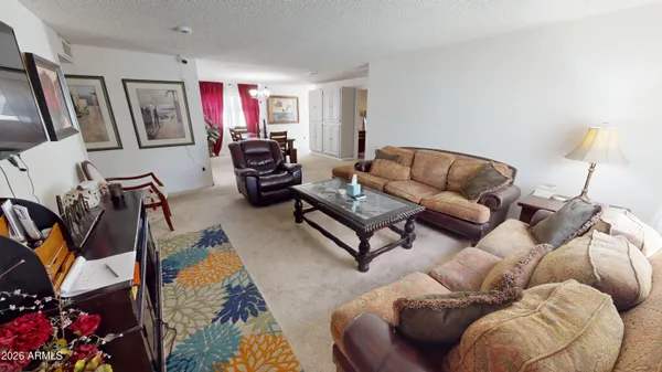 a living room with furniture and a couch