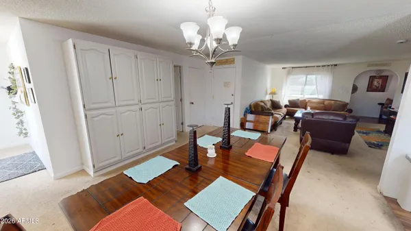 a view of a dining room with furniture