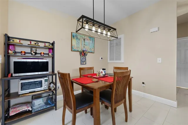 a view of a dining room with furniture