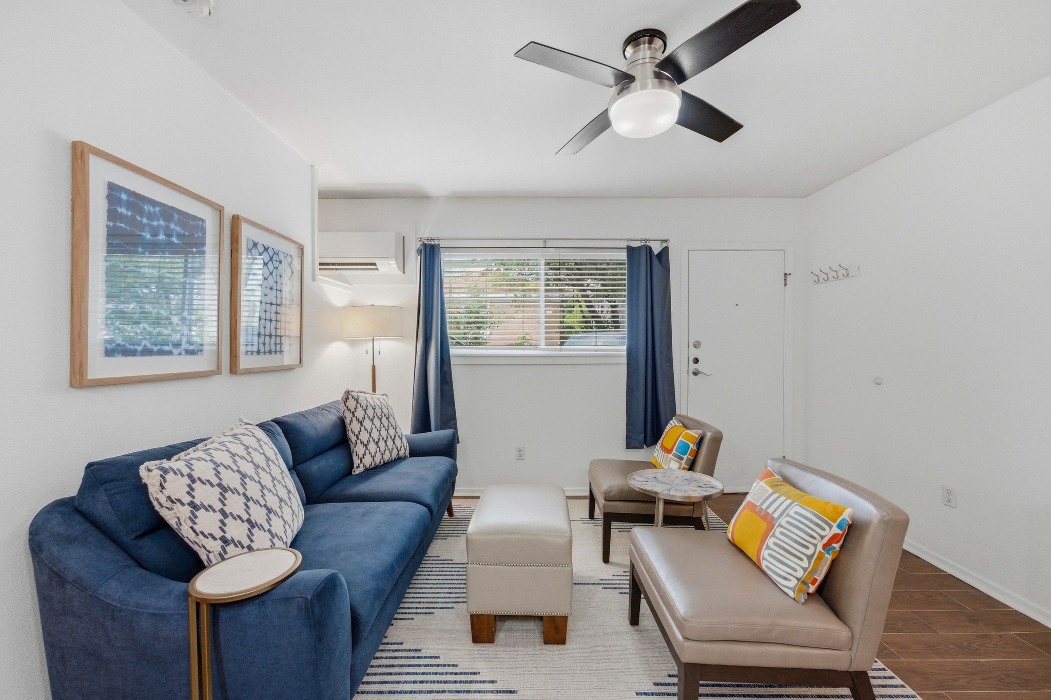 304 East 33rd Street, Unit 11 Austin, TX 78705 - Photo 5 of 27 a living room with furniture and a window