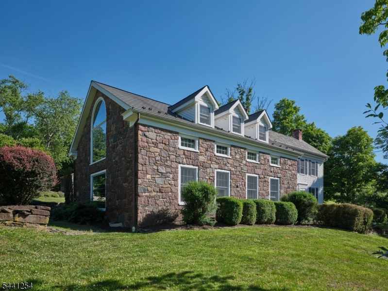 169 Warsaw Road Frenchtown, NJ 08825 - Photo 6 of 50 a front view of a house with a yard