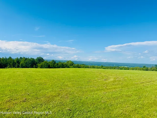 a view of an ocean and a mountain view