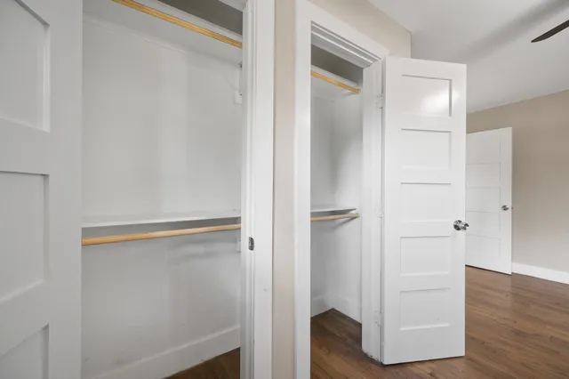 a view of an empty walk in closet