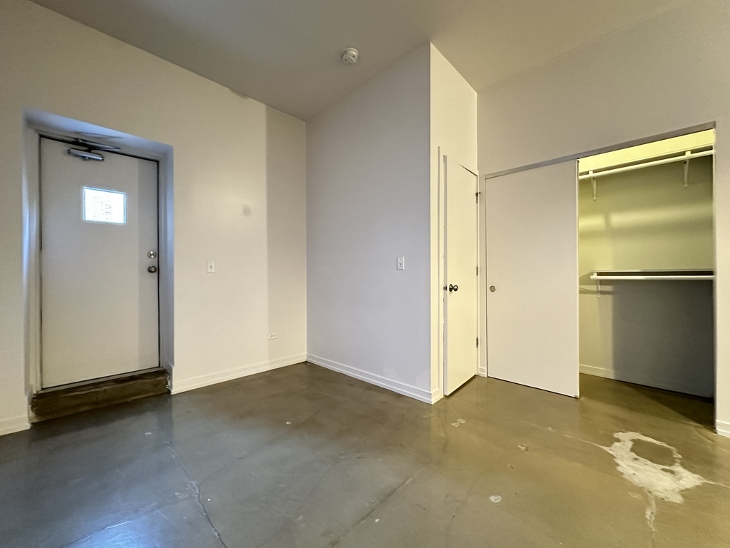 1136 West Wilson Avenue, Unit 202 Chicago, IL 60640 - Photo 15 of 19 a view of an empty room