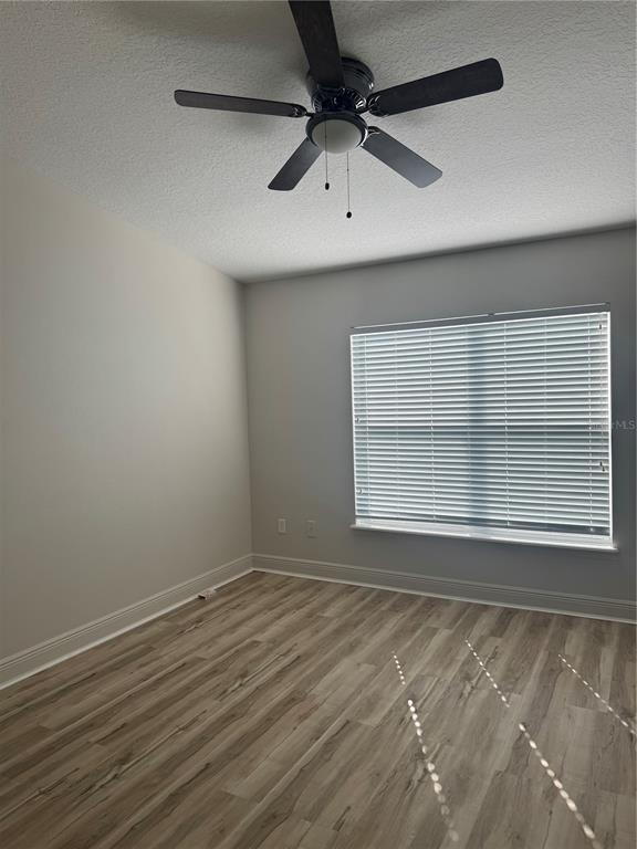 12976 Borland Street Windermere, FL 34786 - Photo 11 of 15 an empty room with a window