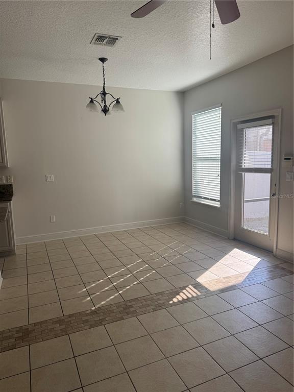 12976 Borland Street Windermere, FL 34786 - Photo 6 of 15 a view of an empty room and window