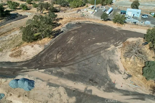 a view of a lake with a yard