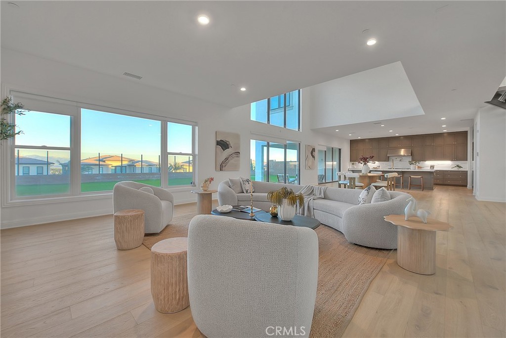20164 Galway Lane Porter Ranch, CA 91326 - Photo 19 of 74 a living room with fireplace furniture and a large window