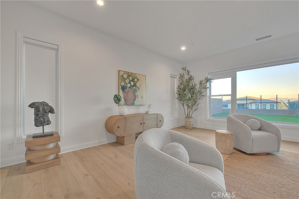 20164 Galway Lane Porter Ranch, CA 91326 - Photo 21 of 74 a bedroom with furniture and a large window