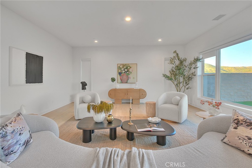 20164 Galway Lane Porter Ranch, CA 91326 - Photo 23 of 74 a living room with furniture and window