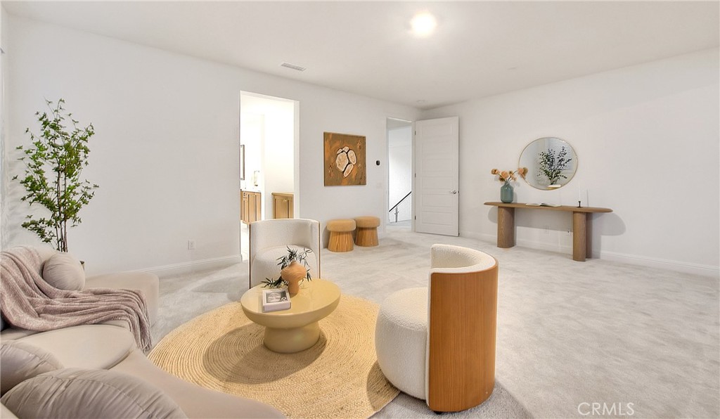 20164 Galway Lane Porter Ranch, CA 91326 - Photo 41 of 74 a living room with furniture and flowers