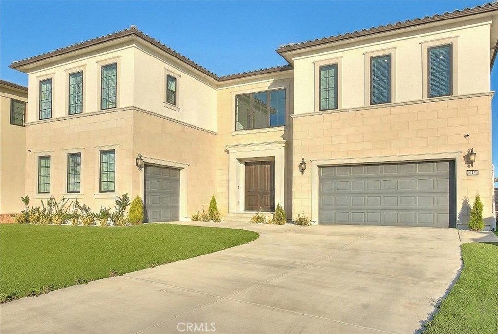 20164 Galway Lane Porter Ranch, CA 91326 - Photo 56 of 74 a front view of a house with a yard