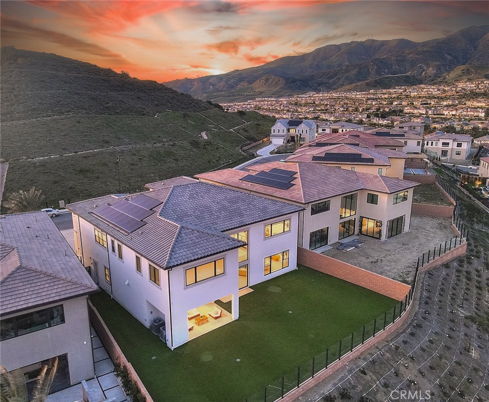 20164 Galway Lane Porter Ranch, CA 91326 - Photo 63 of 74 a aerial view of a house with a big yard