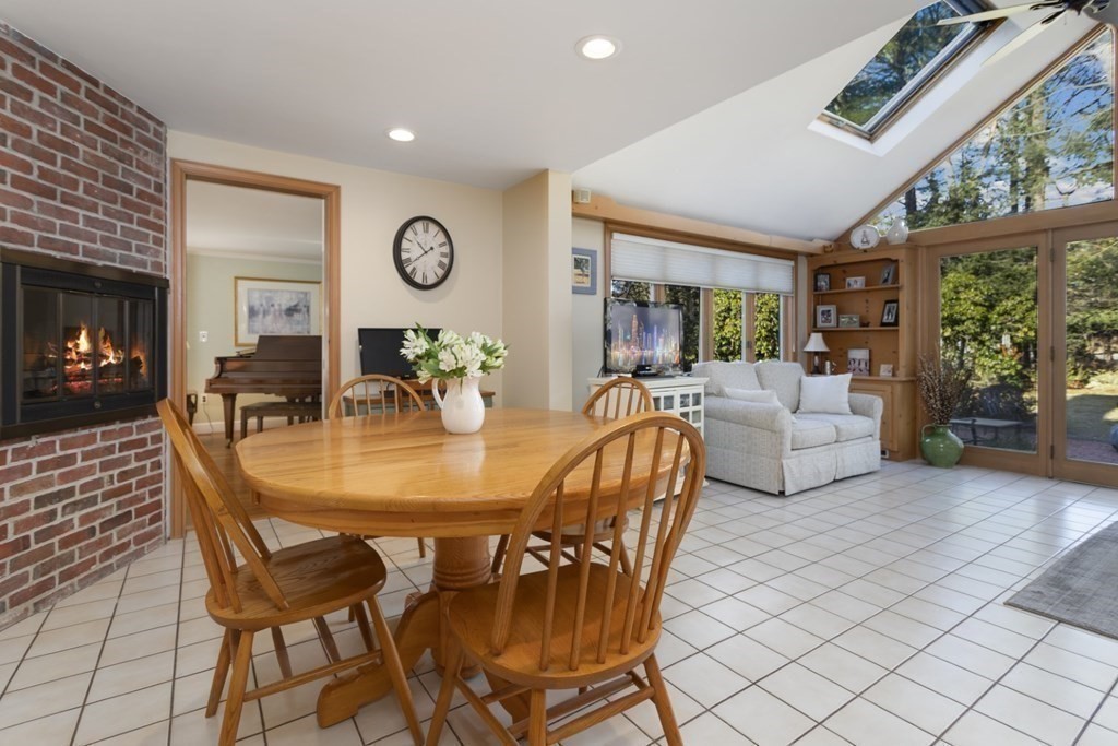 8 Townsend Road Lynnfield, MA 01940 - Photo 13 of 41 a view of a dining room with furniture window and wooden floor