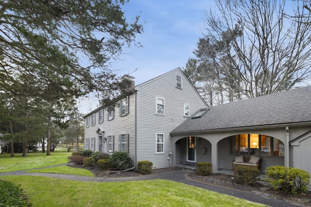 8 Townsend Road Lynnfield, MA 01940 - Photo 2 of 41 a front view of a house with garden