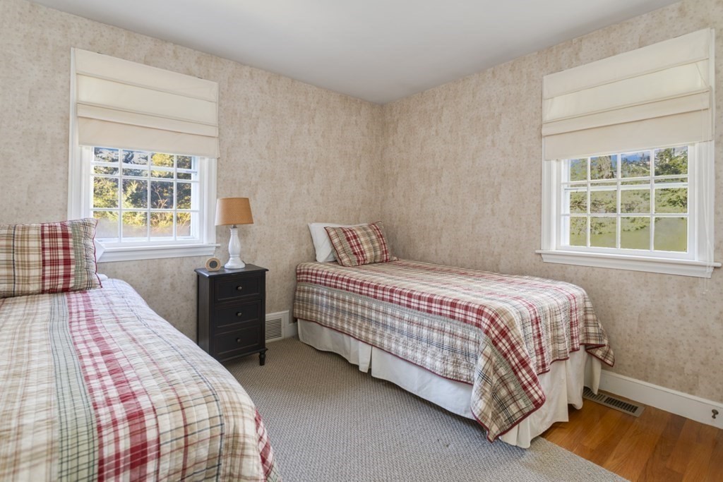 8 Townsend Road Lynnfield, MA 01940 - Photo 25 of 41 a bedroom with a bed and a window with outer view