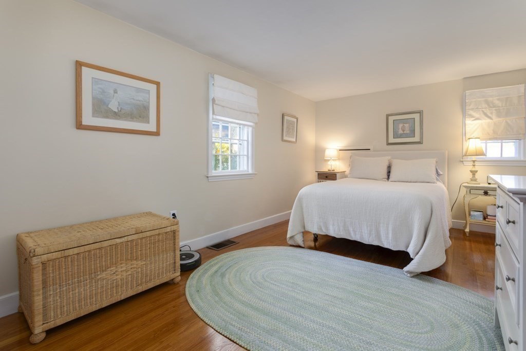 8 Townsend Road Lynnfield, MA 01940 - Photo 26 of 41 a bedroom with a bed and wooden floor
