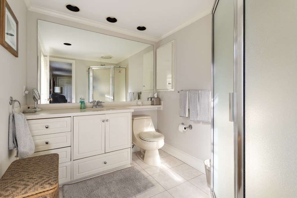 8 Townsend Road Lynnfield, MA 01940 - Photo 29 of 41 a bathroom with a toilet sink and a mirror