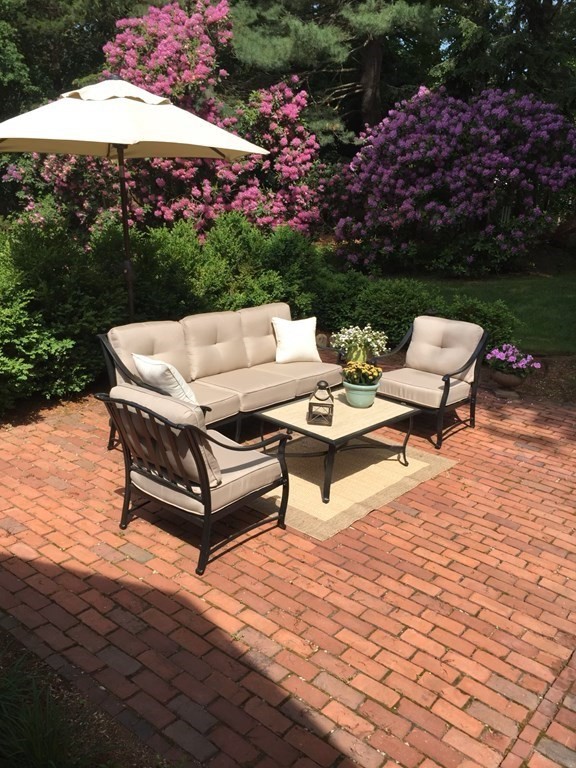 8 Townsend Road Lynnfield, MA 01940 - Photo 36 of 41 a view of a patio with chairs and a table