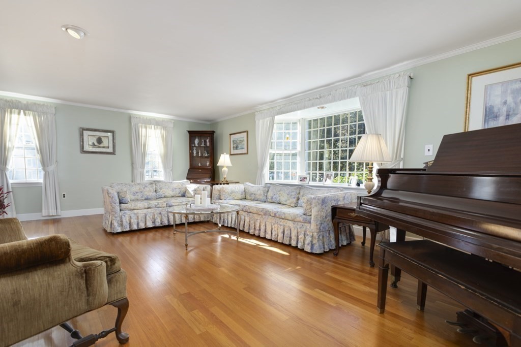 8 Townsend Road Lynnfield, MA 01940 - Photo 7 of 41 a living room with furniture and a couch