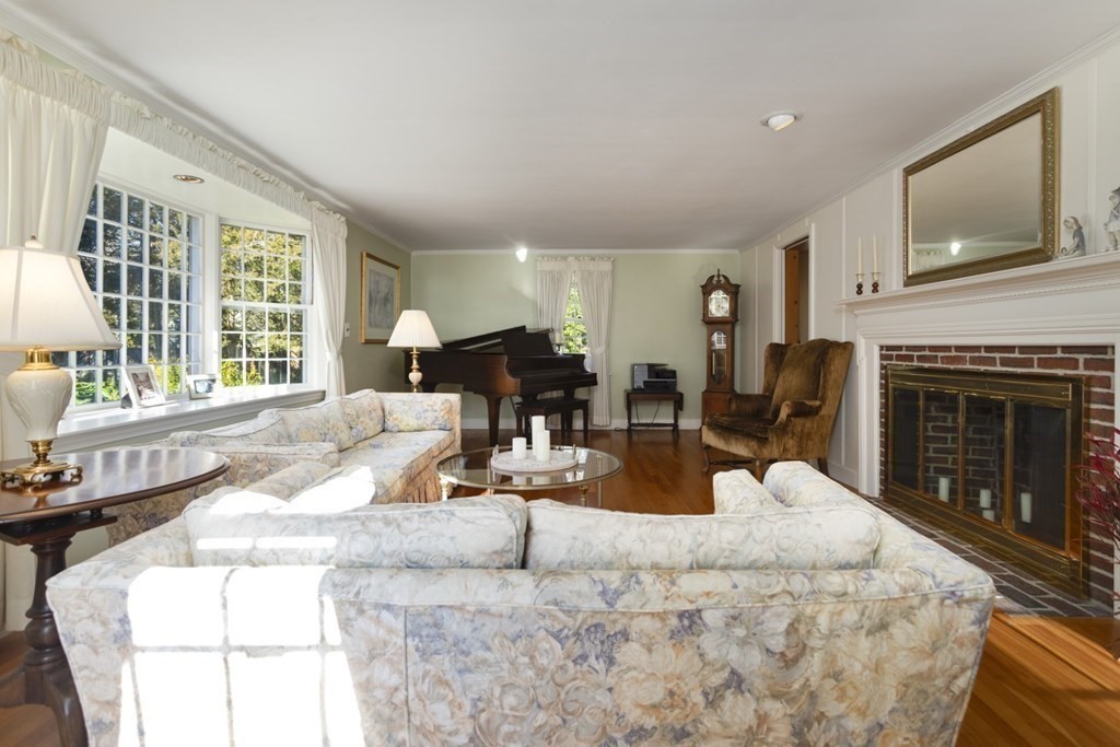 8 Townsend Road Lynnfield, MA 01940 - Photo 8 of 41 a living room with furniture large window and fireplace