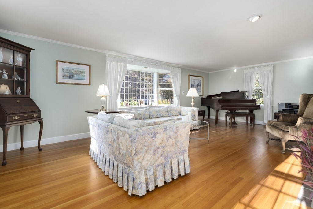 8 Townsend Road Lynnfield, MA 01940 - Photo 9 of 41 a living room with furniture and wooden floor