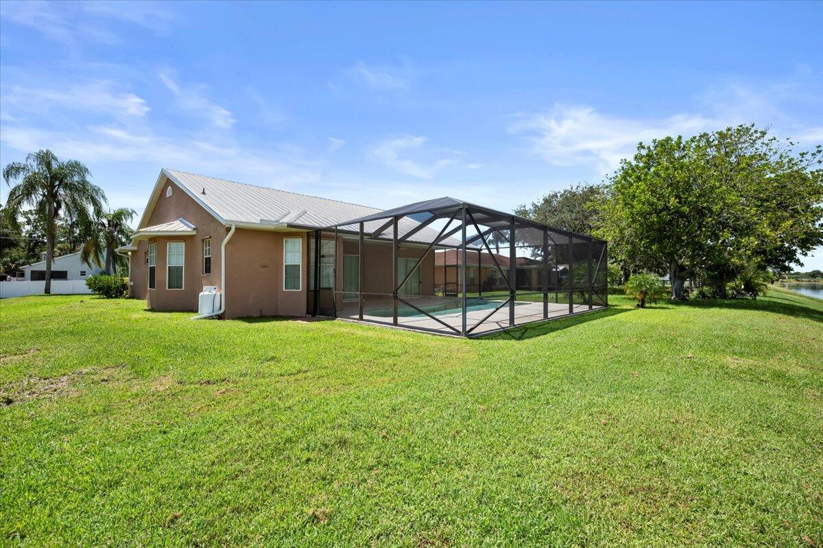 230 Southwest Ridgecrest Drive Port St. Lucie, FL 34953 - Photo 21 of 30 Back of House