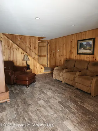 a view of fireplace with washer and dryer