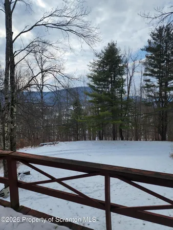 a view of a bench in a yard