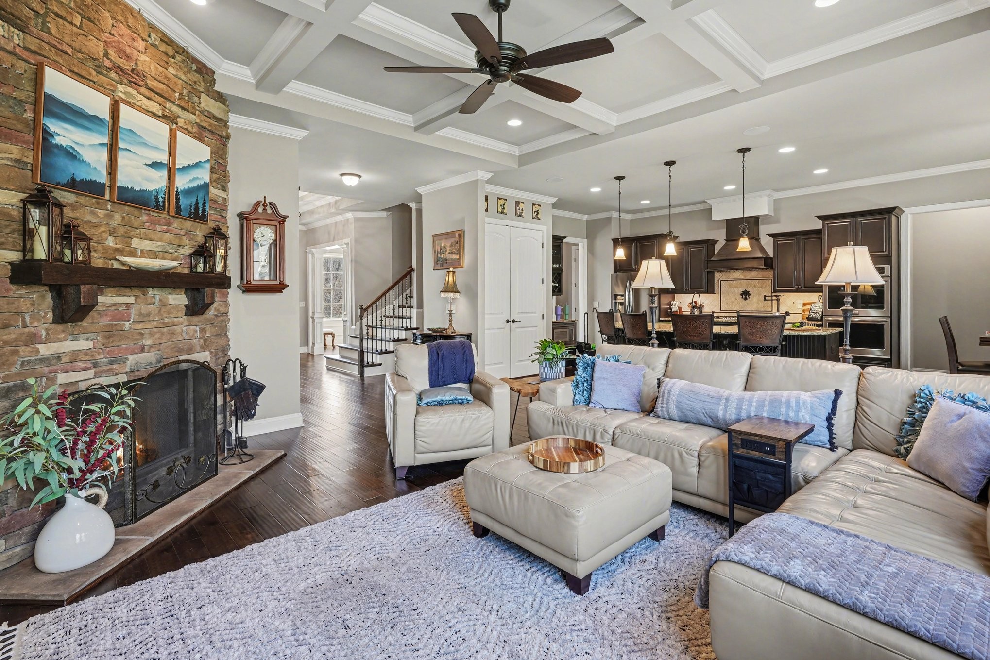 5094 Moss Road Nashville, TN 37221 - Photo 7 of 29 a living room with fireplace furniture and a wooden floor