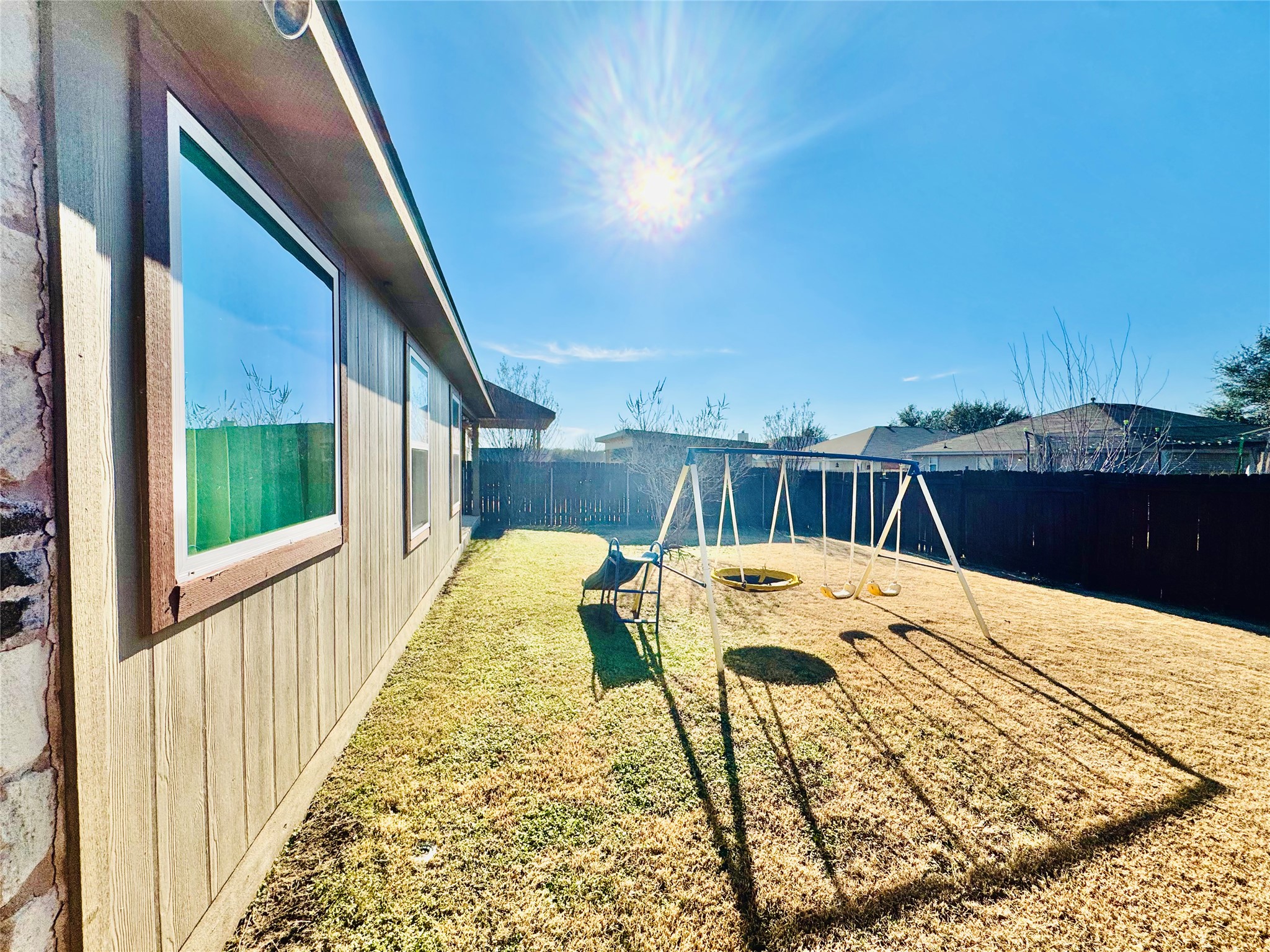 413 Gettysburg Loop Elgin, TX 78621 - Photo 29 of 32 a view of a swimming pool with a patio